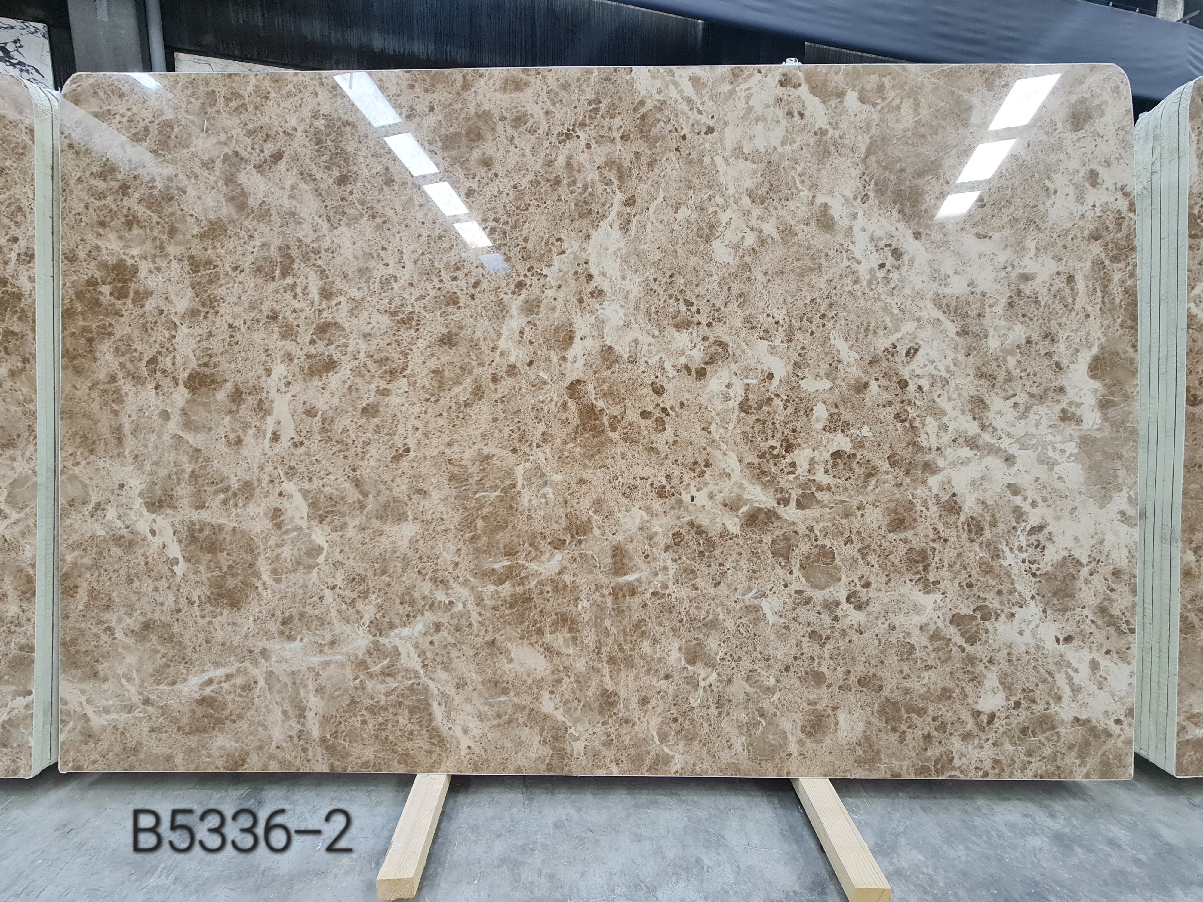 Light Emparador polished slab