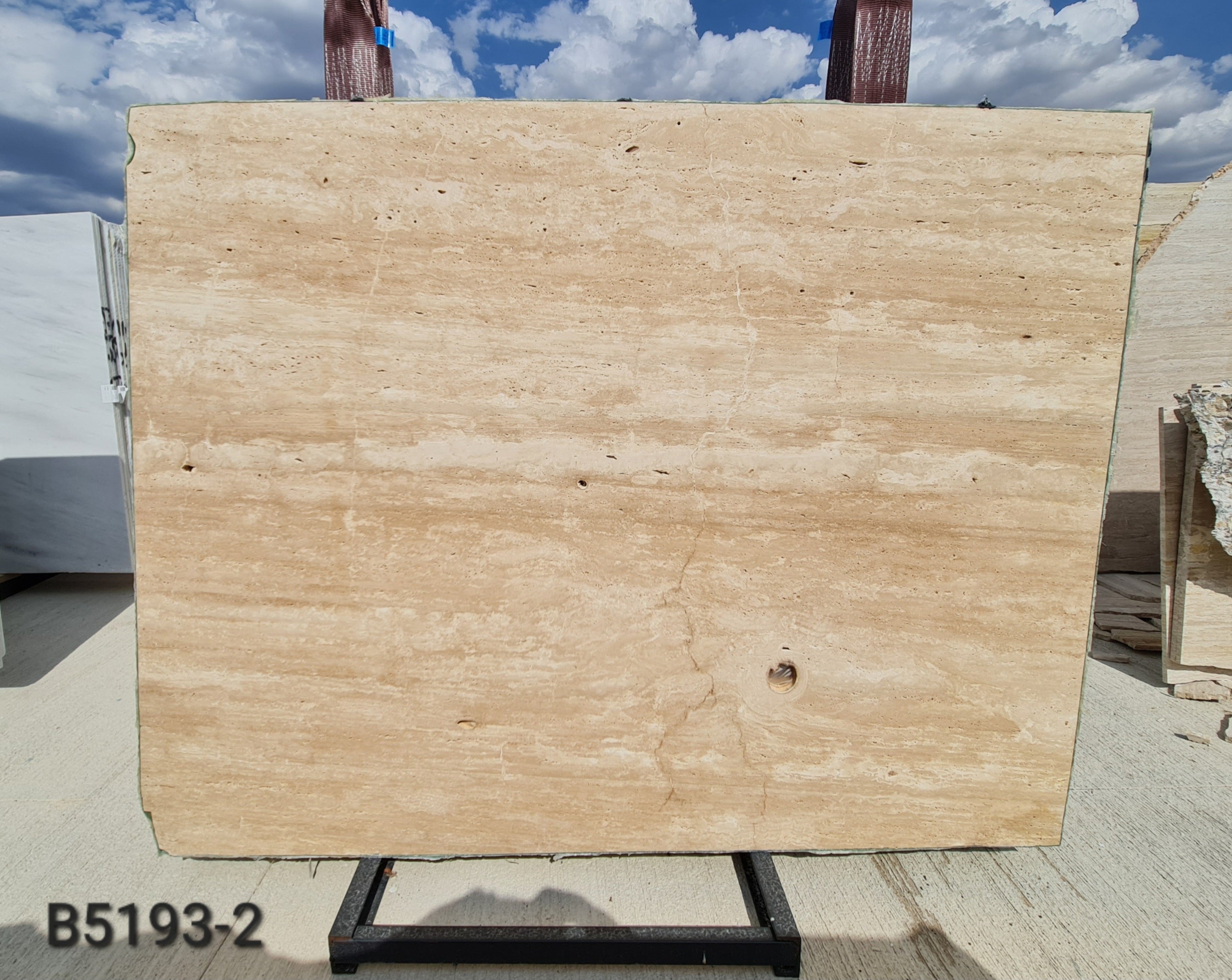 Travertine veincut unfilled honed slab
