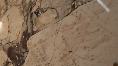 Calacatta Viola marble being inspected at Gemloria, London